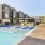sprawling courtyard and pool area on a sunny day