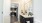 Model bathroom at our senior living apartments in Buford, GA, featuring white countertops and black cabinetry