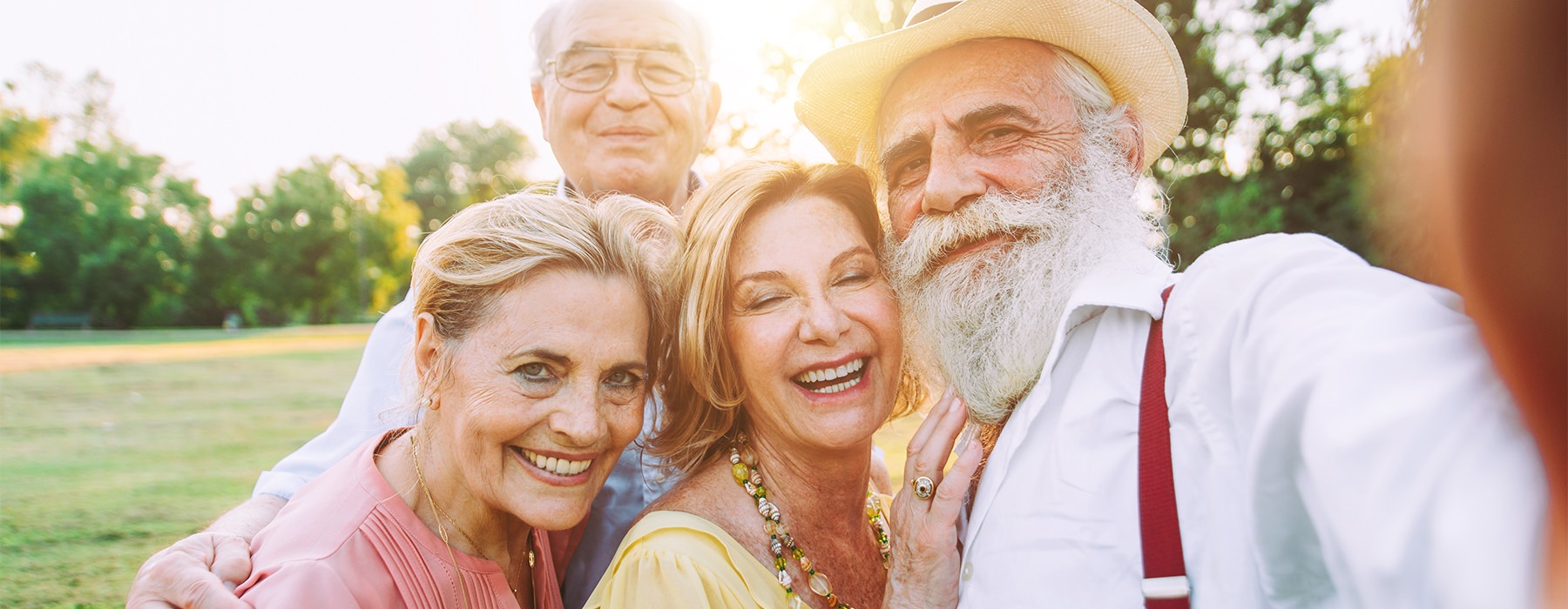 A group of active adults gathered together to take a selfie near our senior living community in Buford, GA.